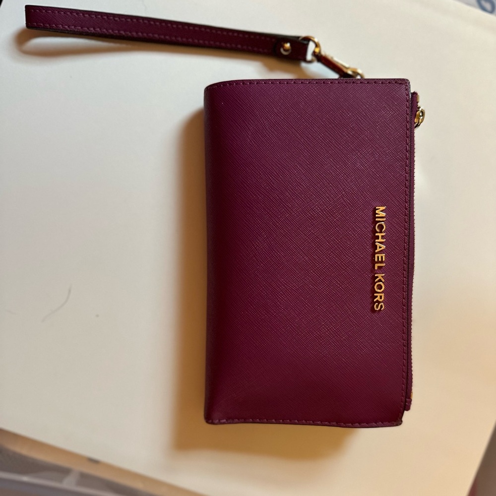 Purple Michael Kors wristlet